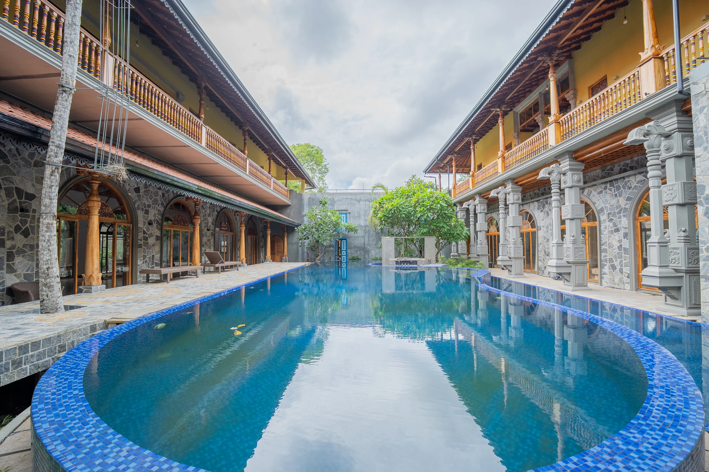 Boutique Hotel & Wellness Resort — Madapatha — pool courtyard panorama